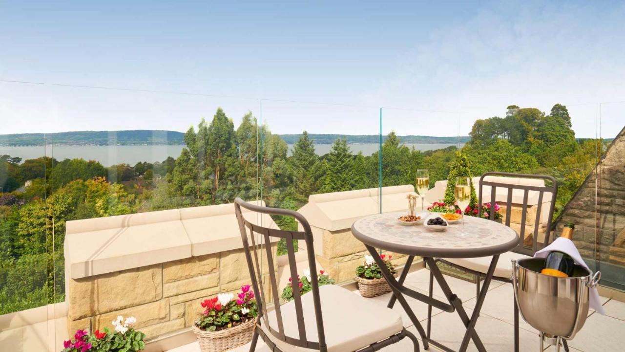 The Culloden Estate And Spa Holywood  Exteriér fotografie A view of the lake from the balcony of a house in the village